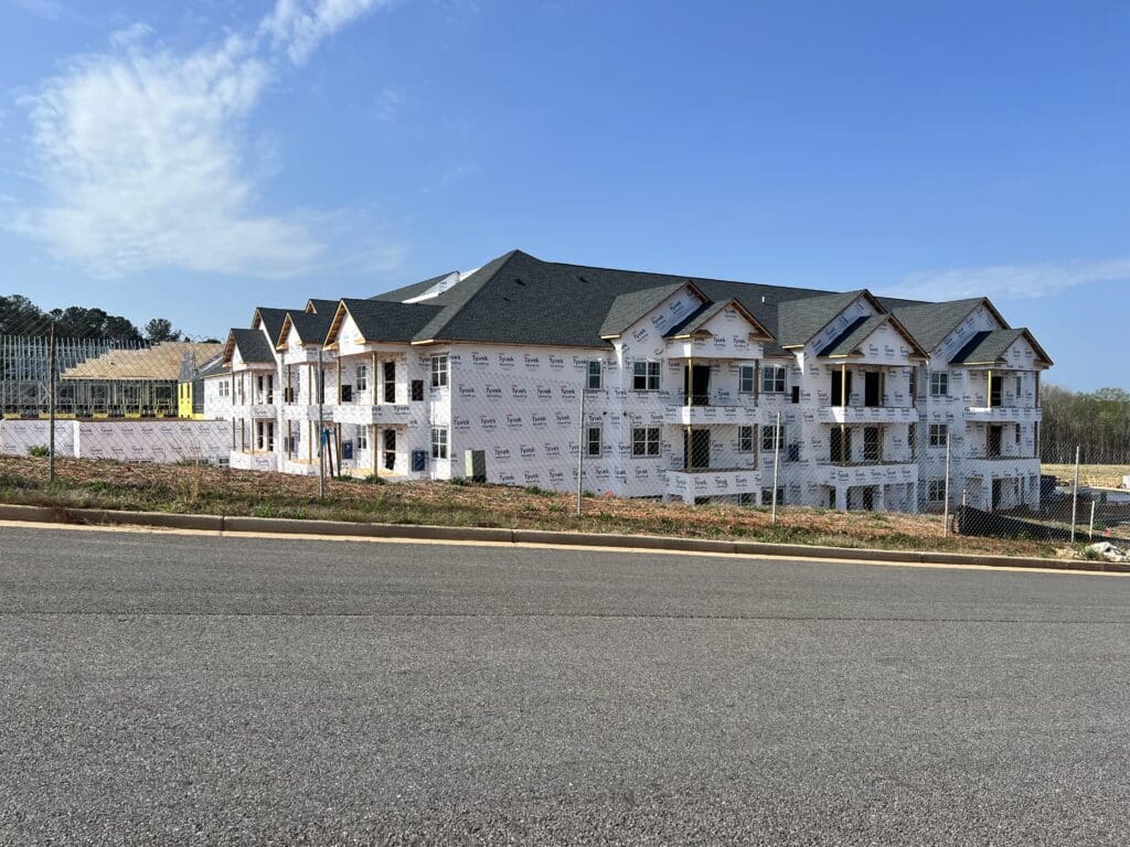 view of community construction from the road